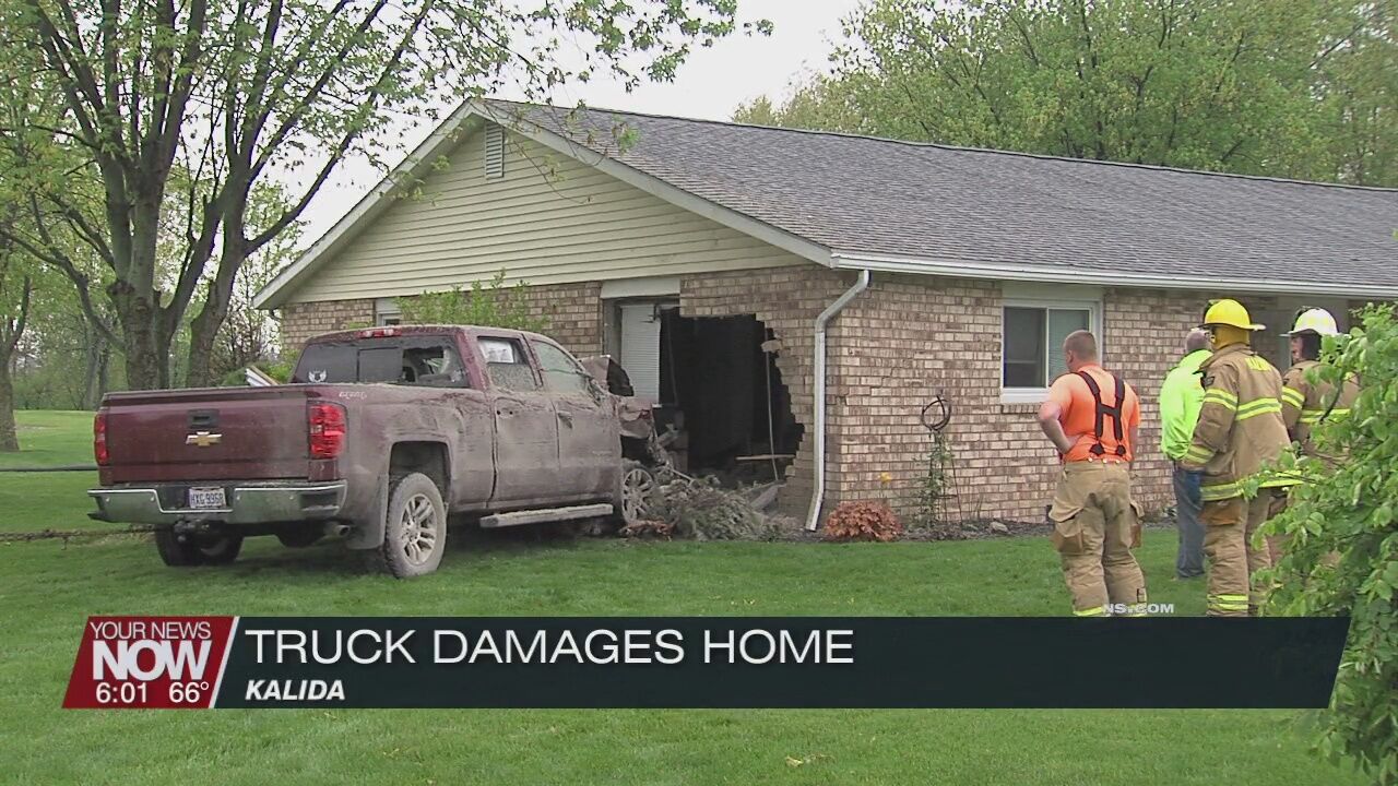 Truck crashes into home in Kalida